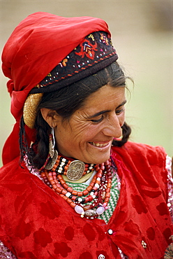 Portrait of a Tajik woman with hat and jewellery at Tashkurgan, Xinjiang, China, Asia