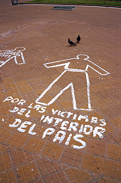 Outline of figure on pavement, the symbol of the lost victims, in the Plaza de Mayo in Buenos Aires, Argentina, South America