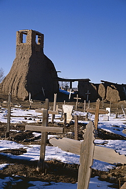 Snow on the ground in February in the old churchyard which was destroyed in the 1847 revolt when 150 Indians died, Taos Pueblo, UNESCO World Heritage Site, Taos, New Mexico, United States of America (U.S.A.), North America