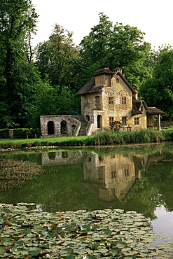 Make-believe mill in Marie Antoinette's Hameau, Petit Trianon, Versailles, UNESCO World Heritage Site, Ile de France, France, Europe