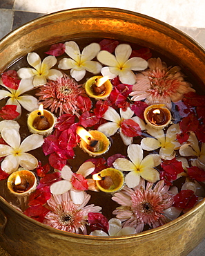 Flower pot with candles in an Indian Spa, India, Asia