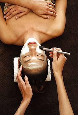 Application of facial mask for facial treatment