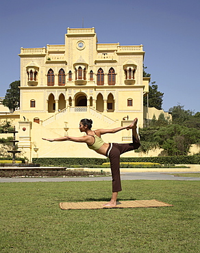 Yoga on the lawn in front of palace at Ananda in the Himalayas, India, Asia