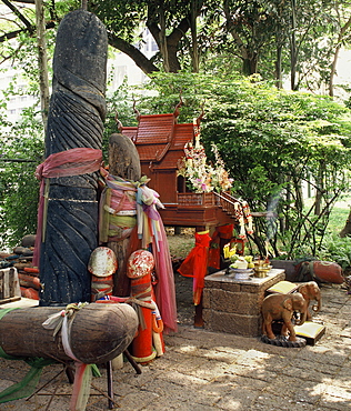 The shrine to Tub Tim, a spirit supposed to enhance fertility for couples and grant a great variety of wishes. Nai Lert Park, Bangkok Thailand, Southeast Asia, Asia