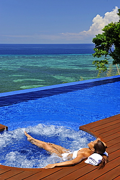 Girl in the jacuzi, Esacaia Resort and Spa, Bohol, Philippines, Southeast Asia, Asia