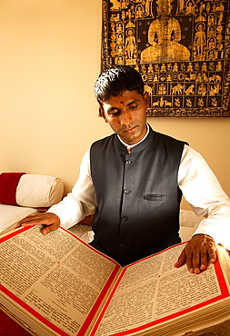 Man reading Vedic texts, Tehri-Garhwal, Uttaranchal, India, Asia