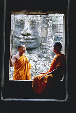 Buddhist monks at the Bayon temple, Angkor, UNESCO World Heritage Site, Siem Reap, Cambodia, Indochina, Asia