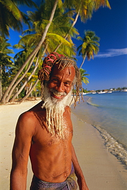 Portrait of a Rasta (Rastafarian) man at Pigeon Point, Tobago, Trinidad and Tobago, West Indies, Caribbean, Central America