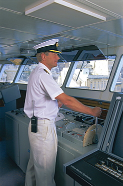 Ship's captain on the bridge, cruise ship