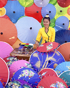 Woman painting umbrellas, umbrella making factory, Bo Sang umbrella village, Bo Sang, Chiang Mai, northern Thailand, Thailand, Southeast Asia, Asia