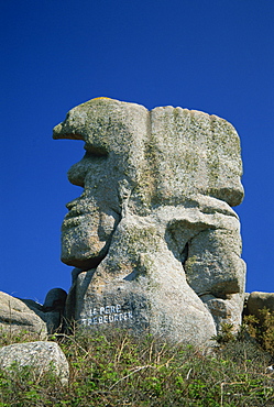 Faces in the rocks, Le Pere Trebeurden, at Trebeurden on the Cote de Granit Rose on the Cotes d'Amor, Brittany, France, Europe