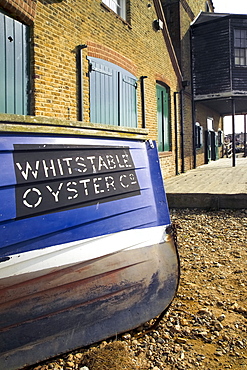 Oyster boat outside the oyster stores on the seafront, Whitstable, Kent, England, United Kingdom, Europe