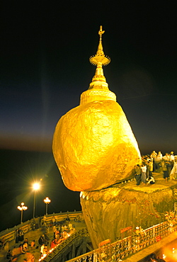 Balanced rock covered in gold leaf, major Buddhist stupa and pilgrim site, Kyaiktiyo, Myanmar (Burma), Asia