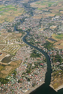 Aerial view of dormitory township on river into south end of Manila Bay, Manila, Philippines, Southeast Asia, Asia