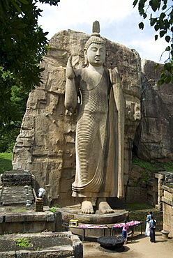 Statue of Buddha, 12 metres tall, carved in granite, Aukana, north of Dambulla, Sri Lanka, Asia