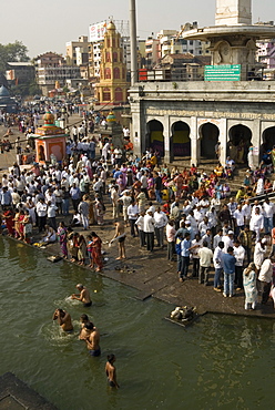 Worshippers at the Ramkund tank on the ghats along the holy River Godavari, Nasik (Nashik), Maharashtra, India, Asia 