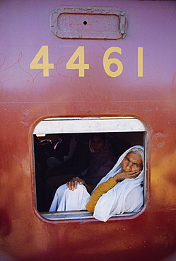Woman on a train at the railway station, Bhopal, Madhya Pradesh State, India, Asia