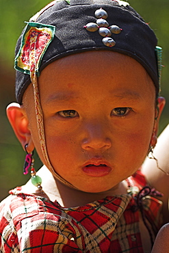 Wan Sai village (Aku tribe) Aku baby girl, Kengtung (Kyaing Tong), Shan State, Myanmar (Burma), Asia