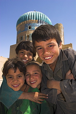 Children in front of the Shrine of Khwaja Abu Nasr Parsa, built in the late Timurid style, Balkh (Mother of Cities), Afghanistan, Asia