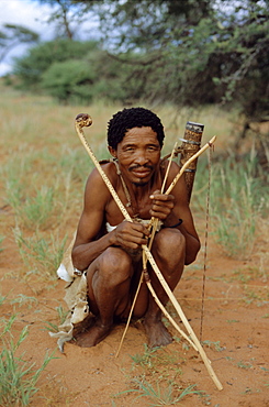 Bushman with bow and arrows, Intu Afrika game reserve, Namibia, Africa