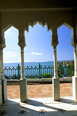 View to sea through Moorish arches at Palacio de Valle, Cienfuegos, Cuba, West Indies, Central America