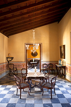 Room interior in the Museo Romantico, Plaza Mayor, Trinidad, Cuba, West Indies, Central America