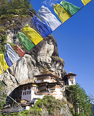 Taktshang Goemba (Tiger's Nest Monastery) and prayer flags, Paro Valley, Bhutan, Asia