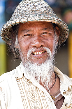 Local man wearing traditional bamboo hat, Amarapura, near Mandalay, Myanmar (Burma), Asia