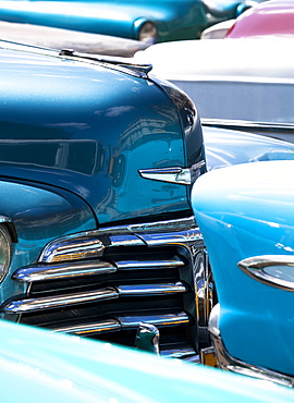 Vintage American cars parked on a street in Havana Centro, Havana, Cuba, West Indies, Central America