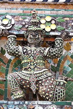 Detail of the Central Prang showing demon figures and ceramic decoration created using broken ceramics used as ballast in the 19th century on Chinese trading ships, Wat Arun, Bangkok, Thailand, Southeast Asia, Asia