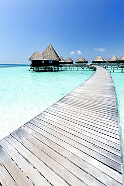 Over-water villas, crystal clear sea and blue sky, Coco Palm, Dhuni Kolhu, Baa Atoll, Republic of Maldives, Indian Ocean, Asia