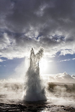 Strokkur Geysir erupting against stormy sky, Geysir, South West Iceland, Polar Regions