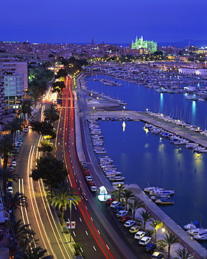 Lights at dusk, with boats in the marina and Palma cathedral across the bay, Majorca, Balearic Islands, Spain, Mediterranean, Europe