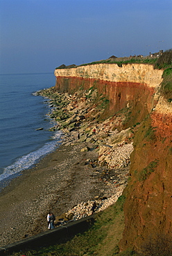 Rockfalls from red and white chalk cliff, Hunstanton, Norfolk, England, United Kingdom, Europe