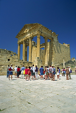 Tourists outside Roman ruins, Dougga, UNESCO World Heritage Site, Tunisia, North Africa, Africa