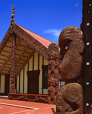 Statues and carvings of tikis on a Marai, Maori Meeting House, at Rotorua, North Island, New Zealand, Pacific