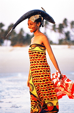 Woman carrying fish on her head, Majunga, Madagascar, Africa