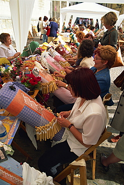 Women lace makers for the church in the southern square of Girona Cathedral on the Costa Brava, Cataluna, Spain, Europe