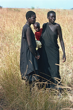 Two Shilluk women, one holding child, Sudan, Africa