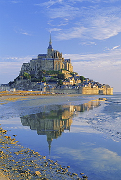 Mont St. Michel (Mont Saint-Michel) reflected in water, Manche, Normandy, France, Europe