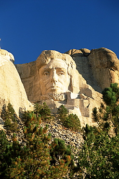 The giant head of President Abraham Lincoln, Mount Rushmore National Memorial, Black Hills, South Dakota, United States of America, North America