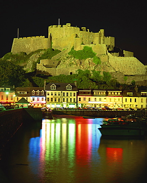 Mont Orgueil and harbour by night, Gorey, Jersey, Channel Islands, United Kingdom, Europe