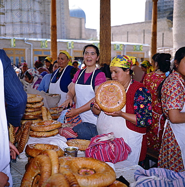 Women selling bread from stalls in the central market in the city of Samarkand, Uzbekistan, Central Asia, Asia