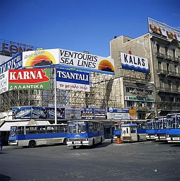 Passenger ferry company signs and buses, Piraeus Port, Greece, Europe