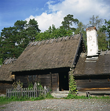 Wooden building with thatched roof of the Oktorp farmstead from Halland, dating from the 18th century, in the Skansen Open Air Museum, in Stockholm, Sweden, Scandinavia, Europe