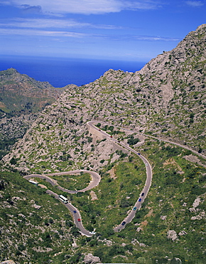 Hairpin bends on winding road up a rocky hill at La Alobra, Majorca, Balearic Islands, Spain, Europe