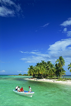 Tourists in boat, Laughing Bird Cay, Belize, Central America