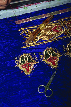 Close-up of gold embroidery work in a factory in Bukhara, Uzbekistan, Central Asia, Asia