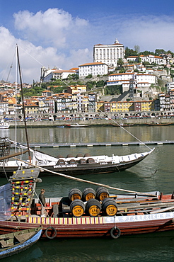 Port barges on Douro River, with city beyond, Oporto (Porto), Portugal, Europe