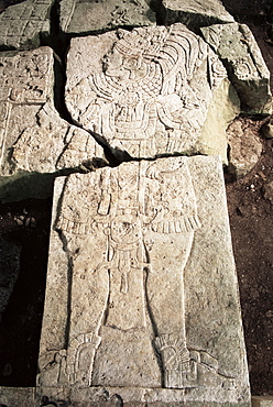 Stela 1, dating from 741AD, with sides cut by looters, Aguateca, Peten, Guatemala, Central America